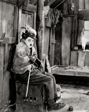 Lot 4132, Auction  119, Film Photography, Charlie Chaplin in "The Gold Rush" and "The Adventurer"