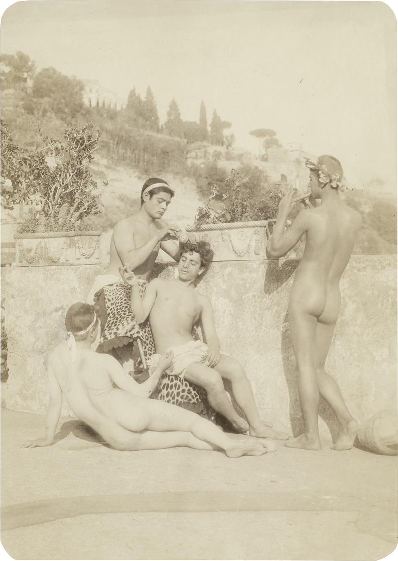 Lot 4057, Auction  119, Gloeden, Wilhelm von, Group of nude youths in front of Arcadian landscape