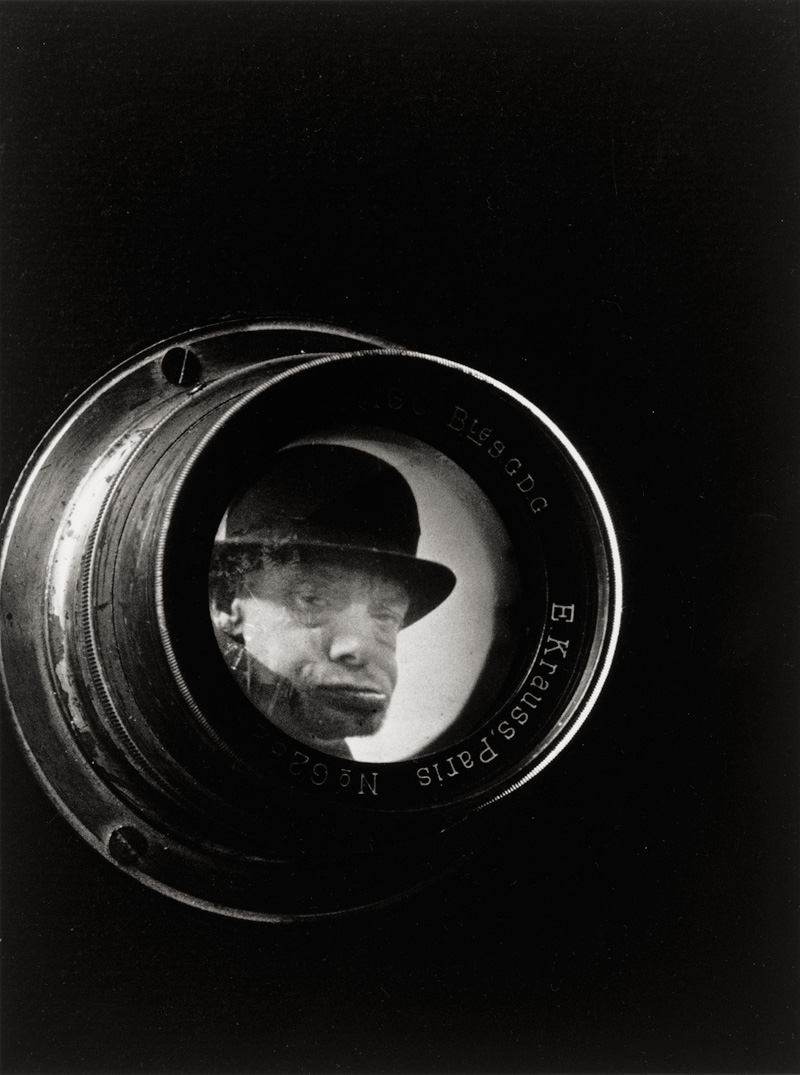 Lot 4131, Auction  120, Doisneau, Robert, Photo montage of a portrait of the clochard Coco and a camera lens