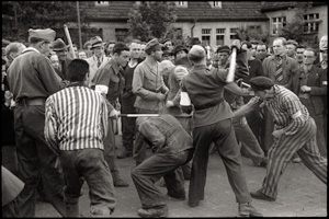 Lot 4104, Auction  123, Cartier-Bresson, Henri, French forced laborers beating their former German guards in Dessau